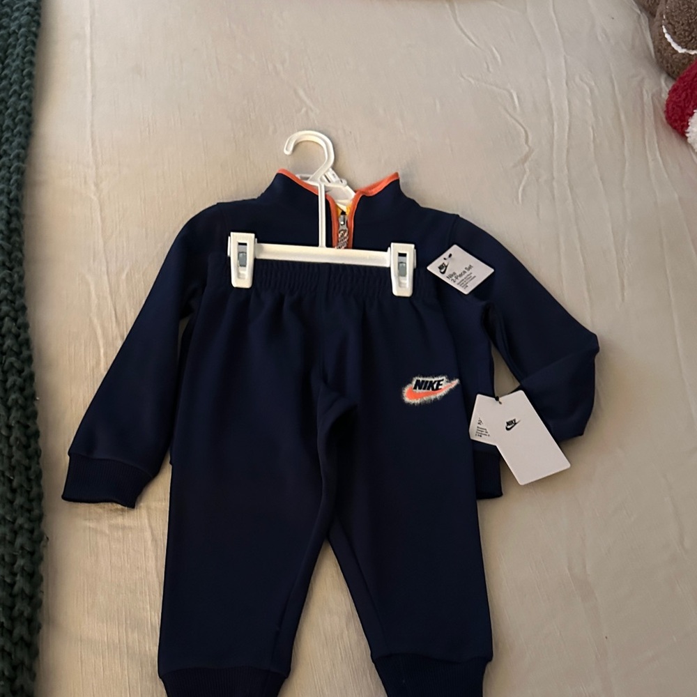 Nike Dark Blue Tracksuit with Orange Trim